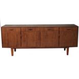 A Gordon Russell, rosewood sideboard, having four frieze drawers with four cupboards below,