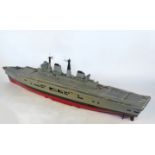 A scale model, of an aircraft carrier,