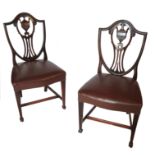 A set of eight mahogany Hepplewhite style dining chairs,