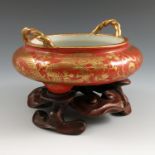 A Chinese porcelain censer, the amber body with gilt five toe dragon decoration and rope handles,