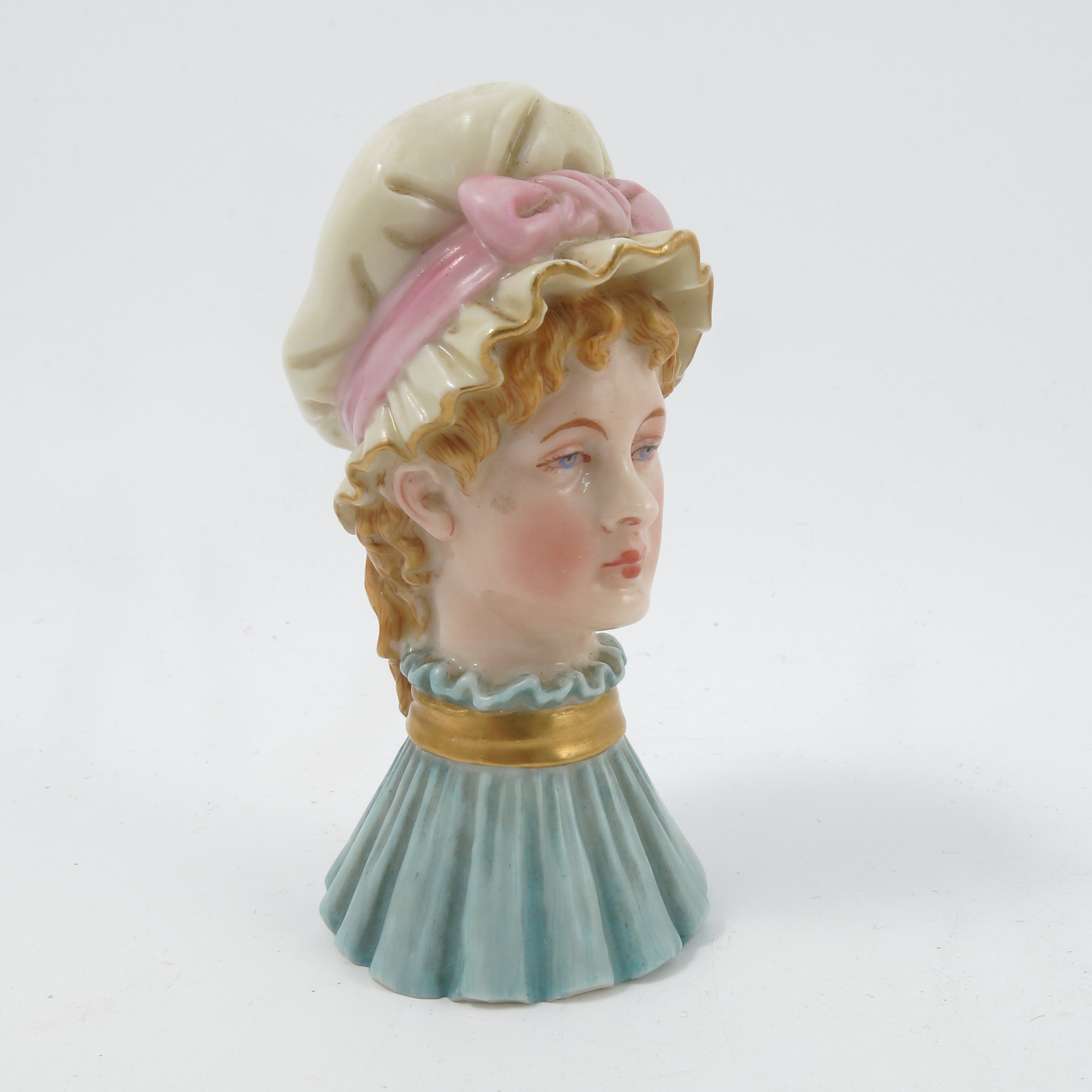 A Royal Worcester candle snuffer, The Mob Cap,