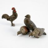 A cold painted bronze figure group, of three pigeons, height 1.