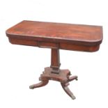 A 19th century rosewood games table, with cross banded top,