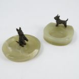 Two cold painted bronze models, of Scottish Terriers, mounted on green onyx bases, diameter 3.