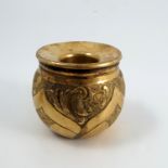 A Betjemann's London gilt metal candle holder,