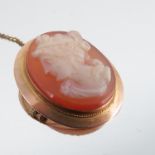 A late Victorian hardstone cameo brooch, stamped '9ct', carved as a female in profile, 34mm long,