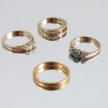 A 9 carat gold three stone opal ring,