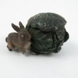 A cold painted bronze inkwell, formed as a rabbit by a cabbage, numbered 683, height 1.