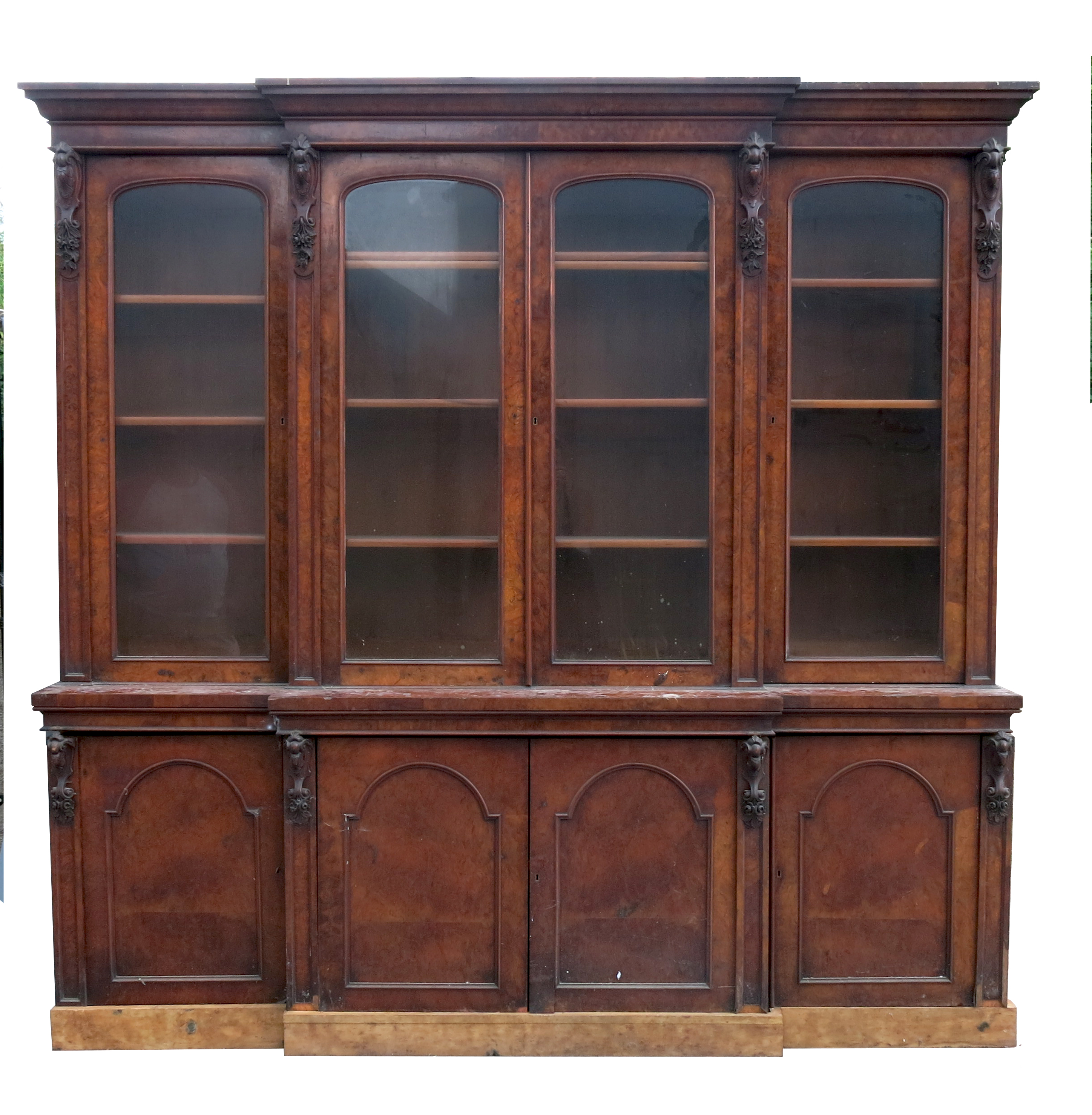 A 19th century burr walnut break front bookcase,