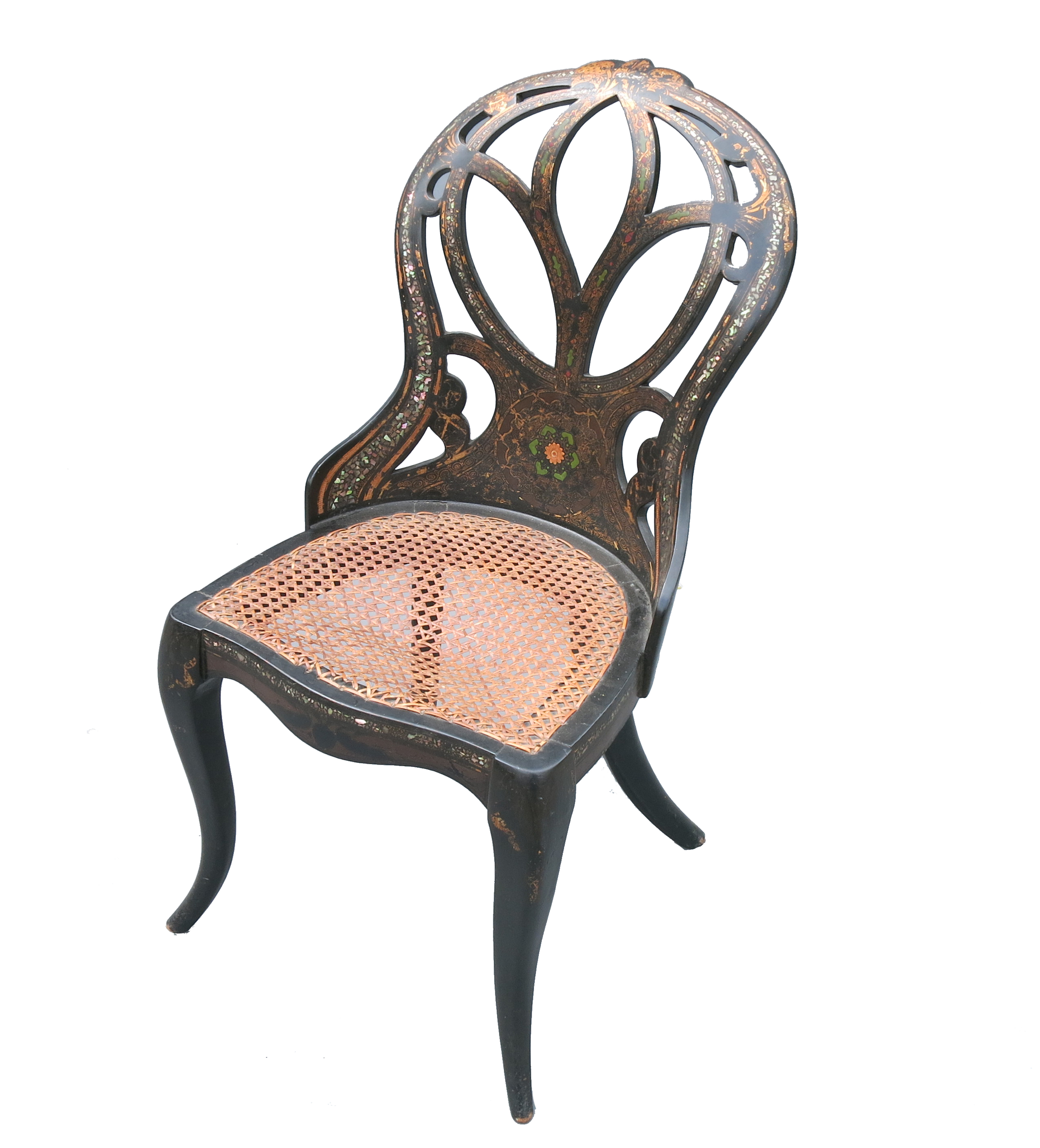 A Victorian black papier mache chair, the pierced scroll back decorated in gilt,