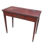 A Georgian mahogany rectangular fold over tea table, raised on square tapering legs,