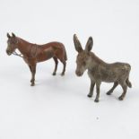 A cold painted bronze model, of a bay horse wearing a bridle, stamped Germany and initials,