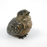 A Bergman style cold painted bronze model, of a seated chick, stamped Geschutzt, height 1.