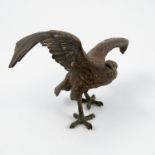 A Bergman style cold painted bronze model, of an eagle with outstretched wings, stamped Geschutzt,