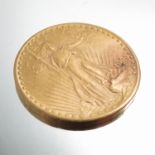 A 1925 American $20 gold coin, 33.