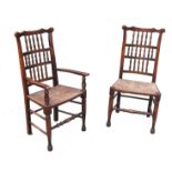 A set of eight reproduction spindle back dining chairs, with rush seats and turned front stretchers,