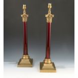 A pair of Vaughan brass and glass Corinthian column table lamps,