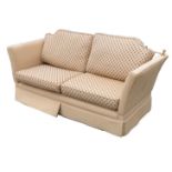 A three piece Knole suite, with two seater sofa and two chairs, sofa width approximately 75ins,