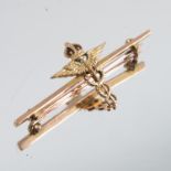 A Medical Corps sweetheart bar brooch, stamped '9ct', 4.4cm long, 2.