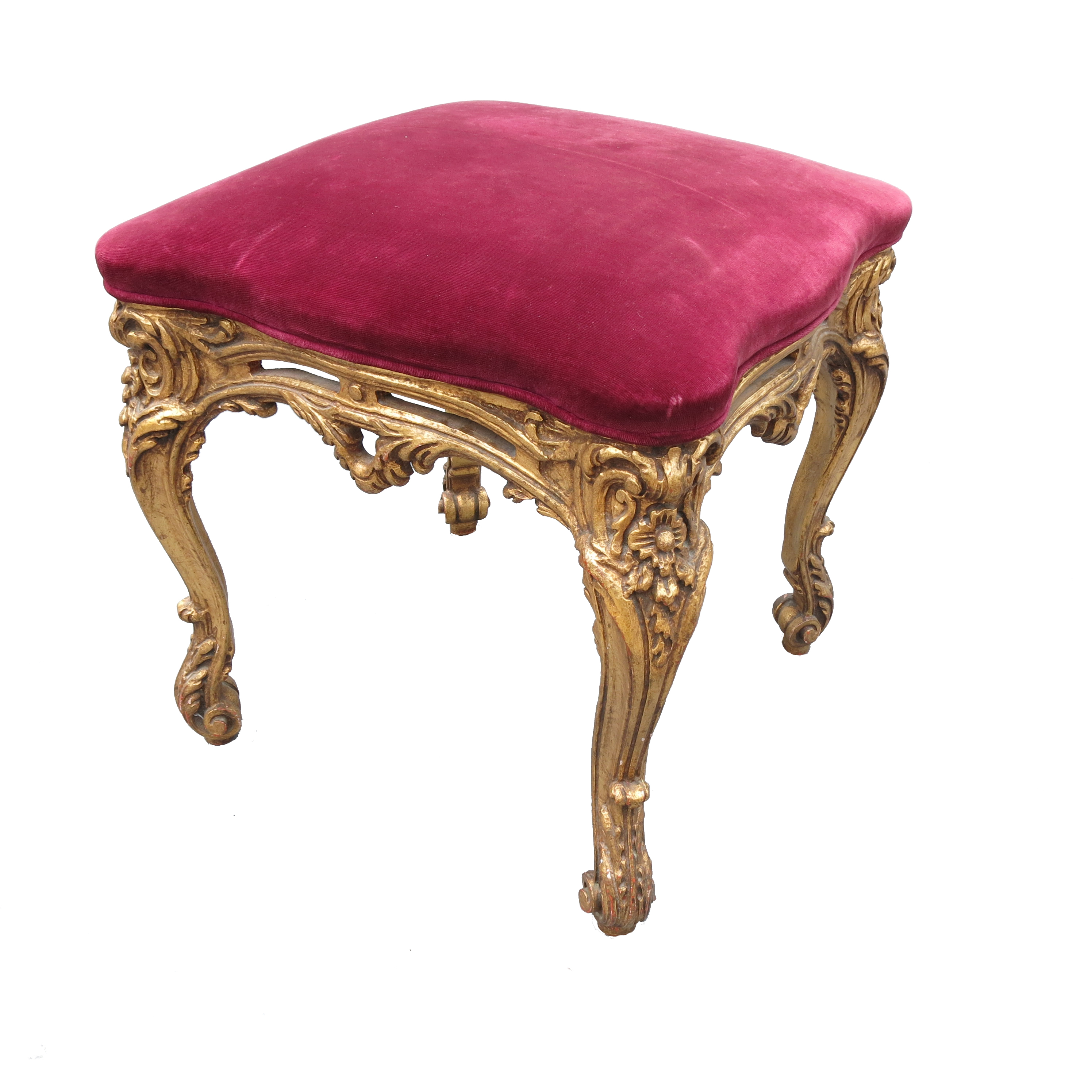 A gilt wood square stool, with shaped stuff over seat, the frame with carved and pierced decoration,