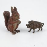 A cold painted bronze model, of a seated red squirrel holding a nut, stamped 938, height 3.