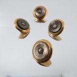 A set of four 18ct gold dress studs,