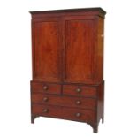 A 19th century mahogany linen press,