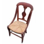 A small 19th century child's rush seated chair,