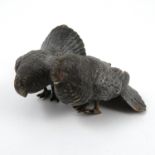 A cold painted bronze model, of two fan tail doves, height 1.