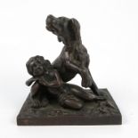 A bronze model, of a seated dog guarding a child sleeping, on a rectangular base,