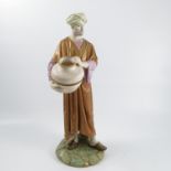 A Royal Worcester 19th century Hadley's model, of an eastern watercarrier, decorated with shot