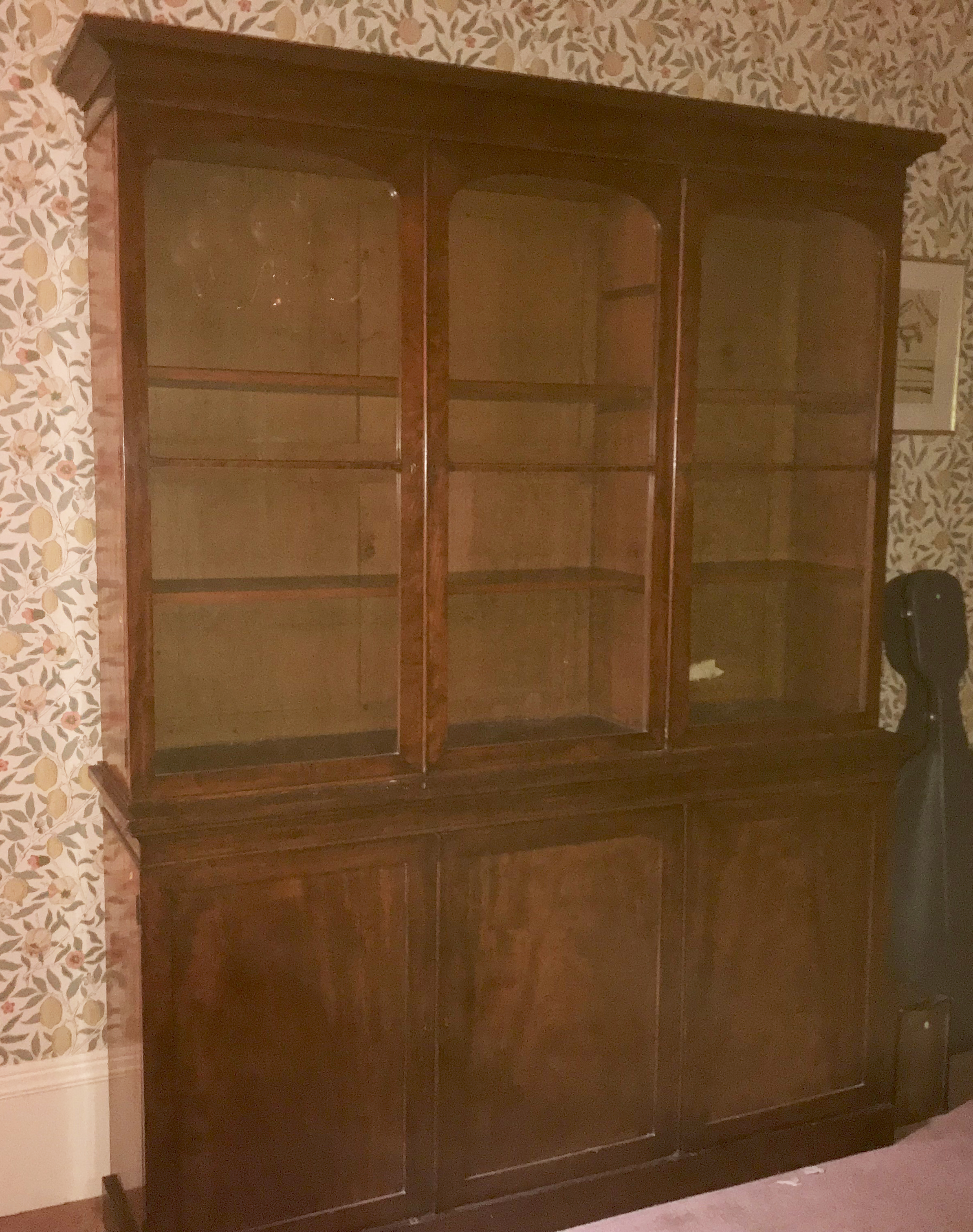 A 19th century mahogany bookcase, having three gla