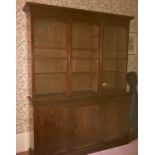 A 19th century mahogany bookcase, having three gla