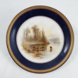 A Royal Worcester plate, decorated with English ca