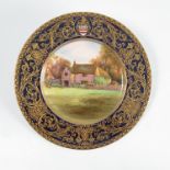A Royal Worcester cabinet plate, printed and paint