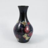 A Moorcroft Pottery vase, decorated in the Pansy p
