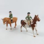 Two Beswick models, of children in green coats, si