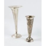 A Tiffany and Co sterling silver trumpet vase, of octagonal form, height 9ins, together with another
