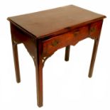 An 18th century oak side table, having a frieze dr