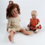A Simon and Halbig bisque headed doll, with brown