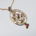 An Edwardian paste and seed pearl pendant, on a chain, cased