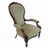 A Victorian show wood grandmother's chair, raised on reeded legs