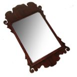 A Georgian design fret cut mirror, mirror size 19ins x 14ins