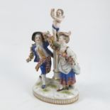 A Continental porcelain figure group, of a cherub