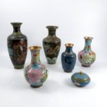 A collection of cloisonné items, to include two vases decorated with flowers and a dragon to a black