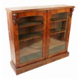 A 19th century walnut bookcase, having two glazed