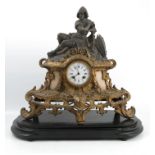A 19th century gilt metal and metal mantle clock, with circular enamel dial, Henri Marc of Paris,