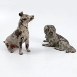Two cold painted bronze models, of a seated terrier and a recumbent rough coated dog, the terrier