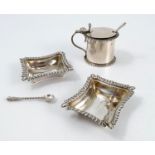 A pair of silver open salts, of shaped rectangular form, with gadrooned edge, with matching