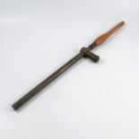 An R & J Beck Ltd World War 1 trench periscope, with wooden handle, length 23.5ins